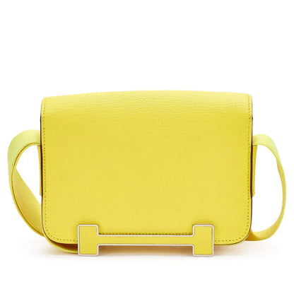 Lemon Yellow Symmetrical Rectangular Flap Shoulder Bag With Wide Woven Fabric Strap And Bar-Shape Metallic Front Fastener