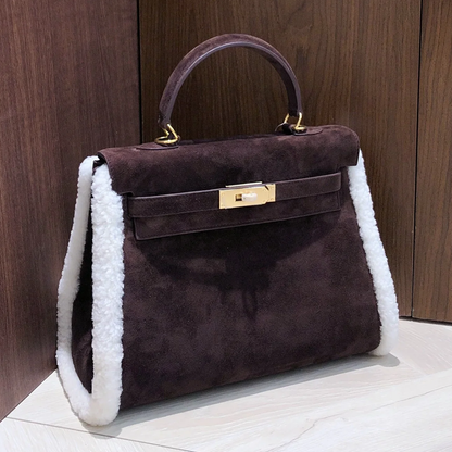 Dark Chocolate Suede Structured Top Handle Bag With White Fluffy Side Trim, Polished Golden Twist Hardware And Spacious Zipper-Lined Interior